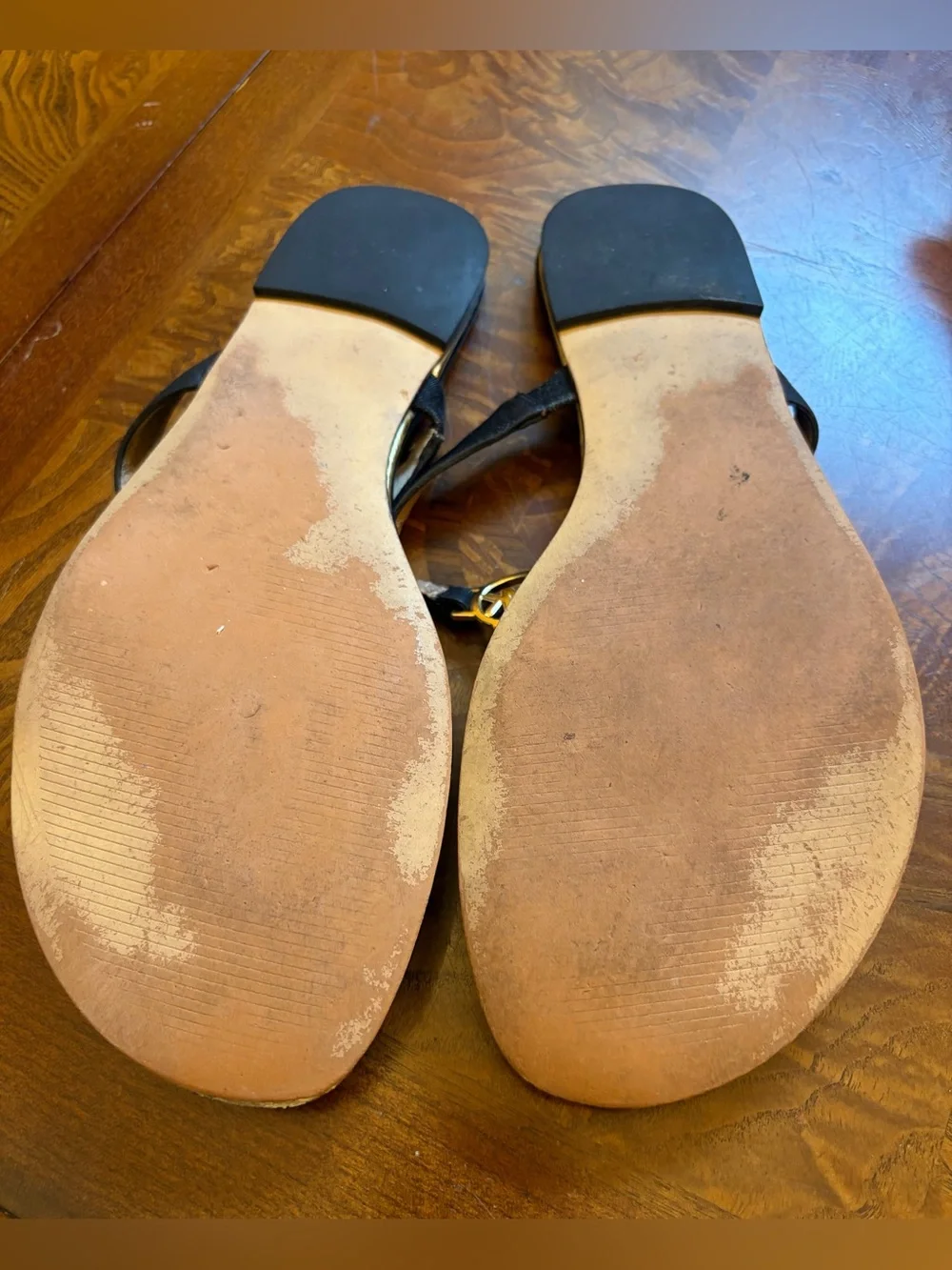 Michael Kors Black Leather T-Strap Sandals with Gold MK Medallions